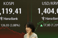 Investors dump Korean shares after tax reform; won plunges